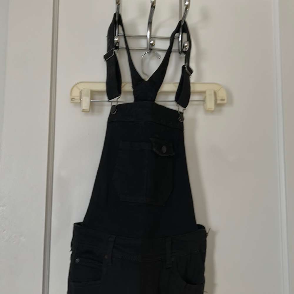 Celebrity Pink black jean overalls. Skinny leg size 27